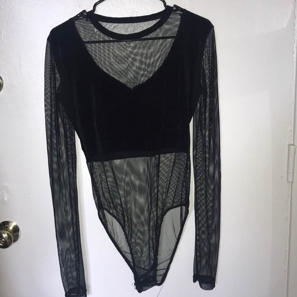 Velvet and fishnet bodysuit.